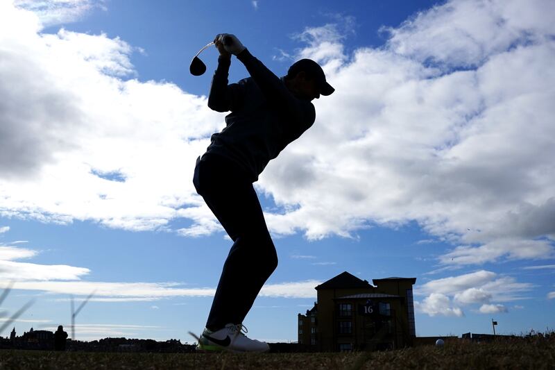 Rory McIlroy drives the ball on the 17th tee at St Andrews. PA