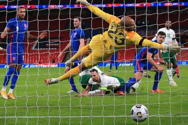 LONDON, ENGLAND - NOVEMBER 12: Harry Maguire of England scores his team's first goal during the international friendly match between England and the Republic of Ireland at Wembley Stadium on November 12, 2020 in London, England. Sporting stadiums around the UK remain under strict restrictions due to the Coronavirus Pandemic as Government social distancing laws prohibit fans inside venues resulting in games being played behind closed doors. (Photo by Nick Potts -