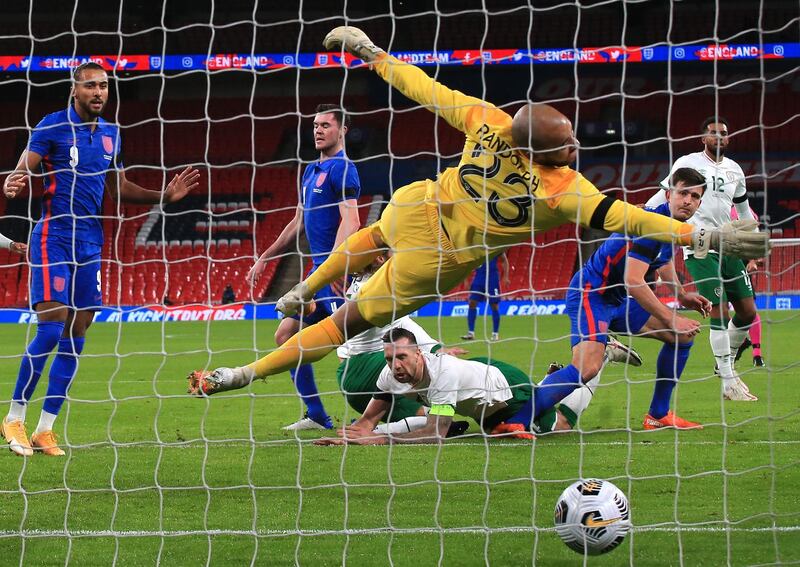 LONDON, ENGLAND - NOVEMBER 12: Harry Maguire of England  scores his team's first goal  during the international friendly match between England and the Republic of Ireland at Wembley Stadium on November 12, 2020 in London, England. Sporting stadiums around the UK remain under strict restrictions due to the Coronavirus Pandemic as Government social distancing laws prohibit fans inside venues resulting in games being played behind closed doors. (Photo by Nick Potts -