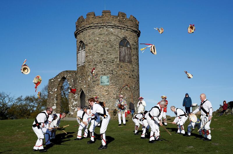Morris dancers throw their hats during May Day celebrations at Bradgate Park, Leicestershire, England. Darren Staples / Reuters