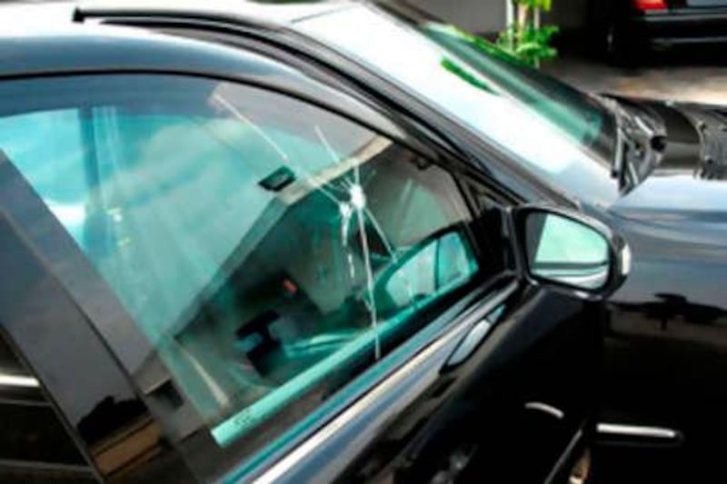 In this picture released by the Press Information Department, bullet marks are seen in a window of the car of Pakistan Prime Minister Yousuf Raza Gilani which was attacked in Islamabad, Pakistan, Wednesday, Sept 3, 2008. Pakistan's prime minister survived an apparent assassination attempt Wednesday when at least two shots hit his limousine as he drove toward the capital.(AP Photo/Press Information Department, HO)**NO SALES** *** Local Caption ***  ISL801_Pakistan_Assassination_Attempt.jpg