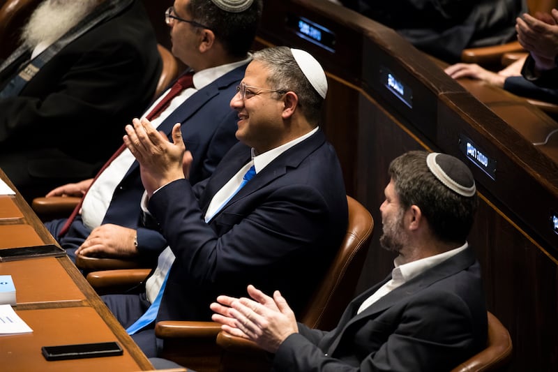 Designated Minister of National Security Itamar Ben Gvir, left, and designated Israeli Minister of Finance Bezalel Smotrich, right, at the session in parliament. Getty Images