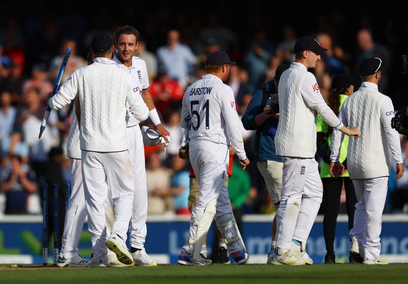 England's Stuart Broad celebrates with teammates after taking the wicket of Australia's Alex Carey to win the fifth Ashes Test. Reuters 