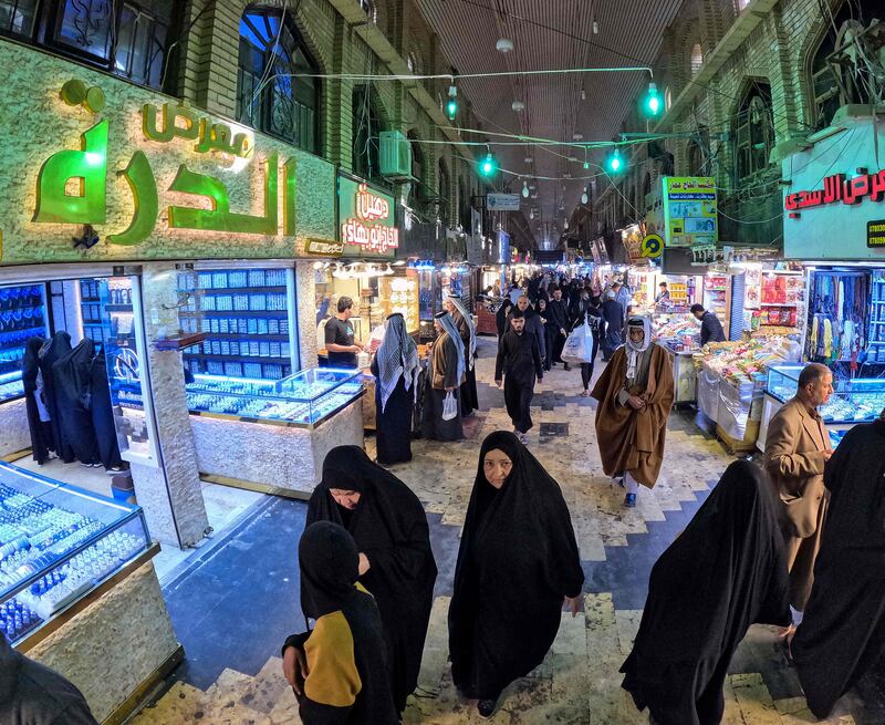 Shoppers in Najaf, Iraq. The Tony Blair Institute is calling on the West to stop taking its influence in the Middle East for granted. AFP