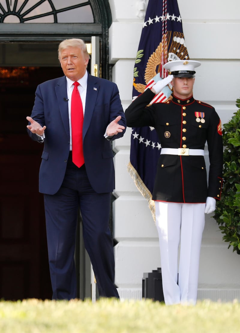 US President Donald Trump arrives to mark the opening day of the Major League Baseball Season. EPA