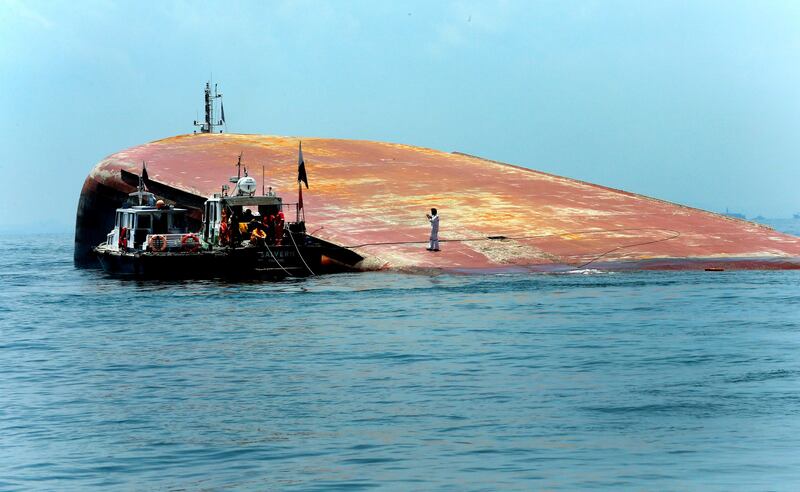 A view of the Dominican-registered dredger JBB De Rong after it collided with the Indonesian-registered tanker Kartika Segara some 1.7 nautical miles south-west of Sisters Island in Singapore. Chew Seng Kim / EPA The Straits Times / SPH Singapore