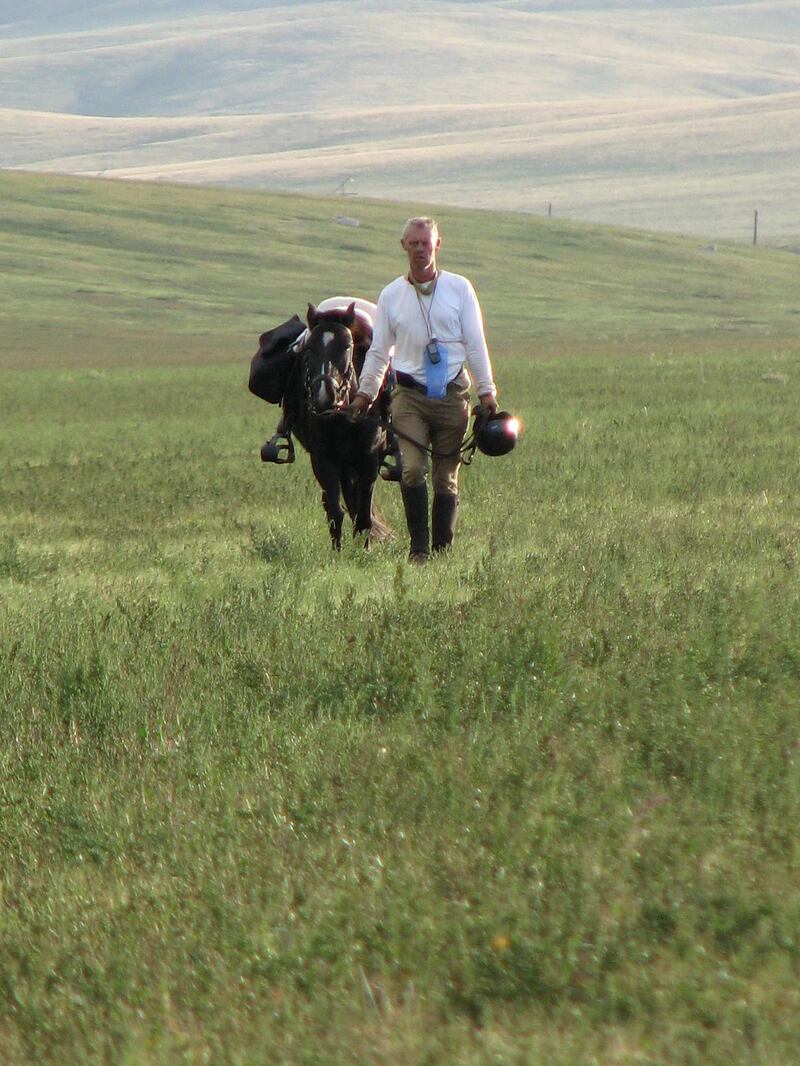 In a handout picture released by the British-based organisation The Adventurists and taken on August 29, 2009, a Mongol Derby rider walks his horse across the steppe, in the Mongol Derby, in northern Mongolia organised by The Adventurists organisation. More than two dozen horsemen raced across the finish line in Mongolia after a test of endurance that would have impressed even legendary tough guy and emperor Genghis Khan. The international group of riders pounded 860 kilometres (530-miles) across the Asian country's vast grasslands in the 10-day Mongol Derby, which organisers call the world's longest horse race. Courtesy of The Adventurists. For travel story about Mongol Derby?