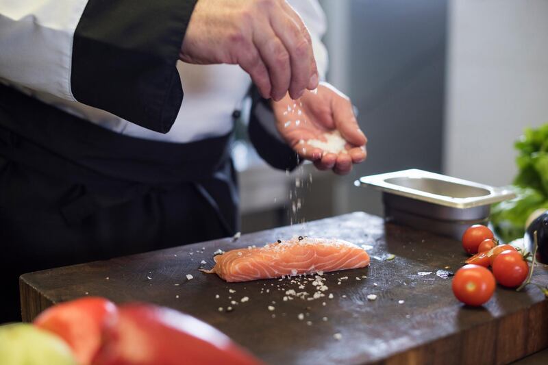 Perfectly spicing the fish. Rzeszow, Poland. Getty Images