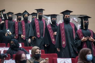 Female pupils at Al Shola American School enjoy their in-person graduation. Leslie Pableo for The National for Amir's story