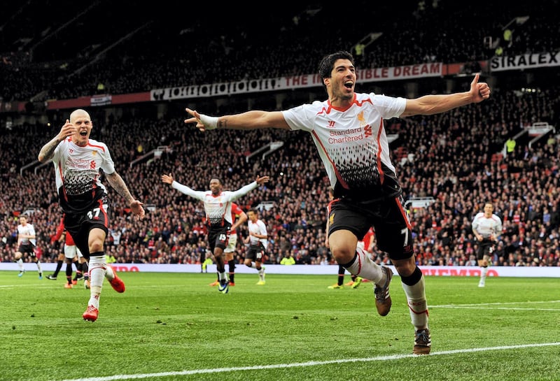 MANCHESTER, ENGLAND - MARCH 16:  (THE SUN OUT, THE SUN ON SUNDAY OUT) (This is a retransmission of image number 479120779) Luis Suarez of Liverpool celebrates after scoring the third goal during the Barclays Premier Leauge match between Manchester United and Liverpool at Old Trafford on March 16, 2014 in Manchester, England.  (Photo by John Powell/Liverpool FC via Getty Images)