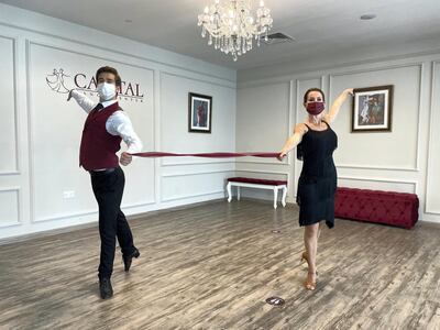 Dancers use a ribbon to practise their moves while maintaining a distance. Courtesy Capital Dance Centre