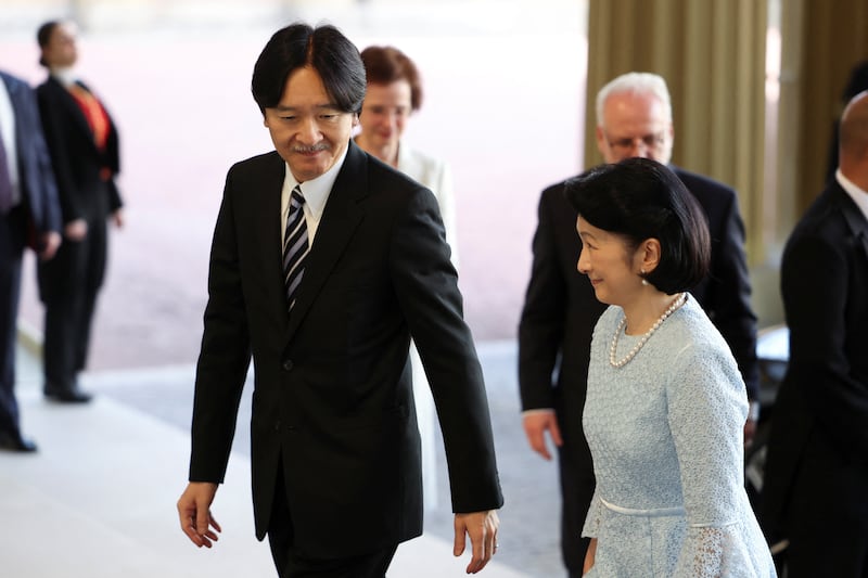 Japanese Crown Prince Fumihito and Crown Princess Kiko arrive at the reception. Reuters
