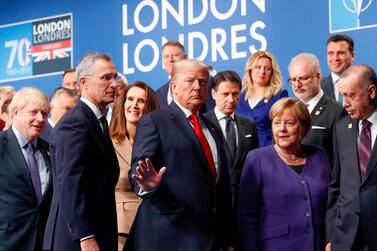 US President Donald Trump, centre, at the Nato summit in London commemorating the alliance's 70th anniversary last year. AFP