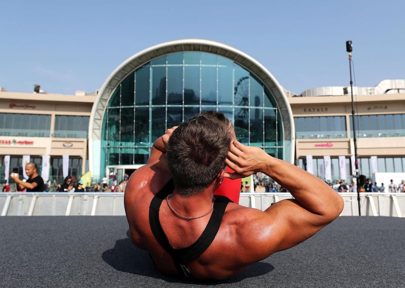 Dubai, United Arab Emirates - October 26, 2018:  HIIT Your Core workout at Dubai Fitness Challenge. The Crown Prince of Dubai renews his emirate-wide call for every resident to take part in 30 minutes of exercise for 30 days. Friday, October 26th, 2018 Festival City Mall, Dubai. Chris Whiteoak / The National