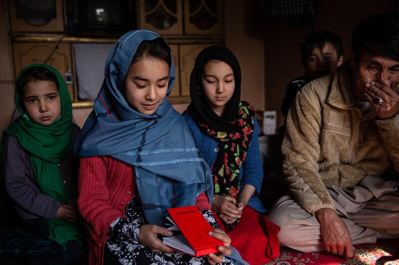 Narges, 12, is one of Agha Gul's daughters. Her mother Soraya was killed in the maternity ward attack in Kabul's Dasht-e-Barchi neighbourhood in May 12, 2020. Narges has started to write poetry to deal with her loss. 