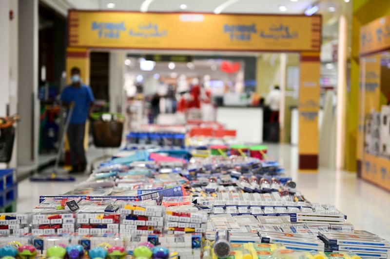 Each year, families spend thousands of dirhams on school uniforms, bags, shoes, caps and sports kits before the new term. Khushnum Bhandari / The National
