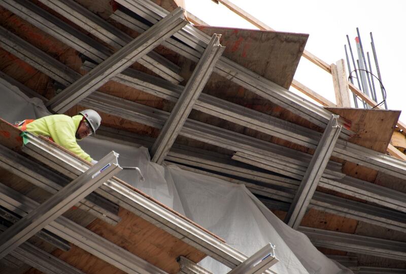 (FILES) In this file photo taken on December 08, 2017 Men work on a construction site in Washington, DC, on December 8, 2017. The US economy kicked into high gear in the first three months of the year, quashing fears of a slowdown, the government reported on April 26, 2019. GDP expanded at an annual rate of 3.2 percent in the January-March period, smashing economists' expectations and surpassing the 2.2 percent growth in the final quarter of 2018, according to a preliminary estimate by the Commerce Department. / AFP / mari matsuri
