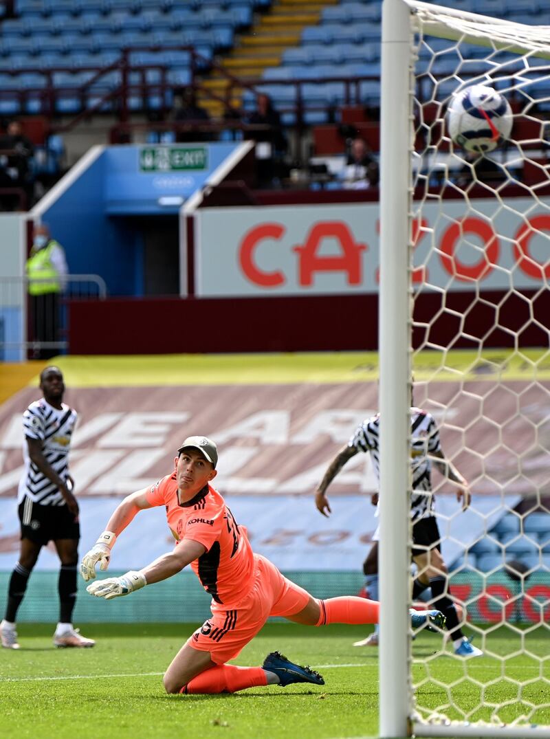 United goalkepeer Dean Henderson watches Bertrand Traore's strike hit the back of the net. EPA