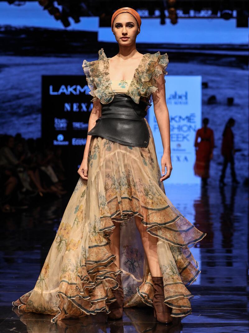 epa07787598 A model presents a creation by fashion brand store Ritu Kumar during the Lakme Fashion Week (LFW) Winter/Festive 2019 in Mumbai, India, 23 August 2019. More than 75 designers are showcasing their collections at the event until 25 August.  EPA/DIVYAKANT SOLANKI