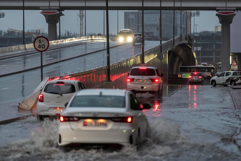Safety alerts were issued as large parts of the UAE were hit by heavy rain, thunder and lightning overnight and into Monday morning. Antonie Robertson/The National