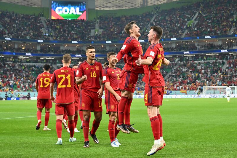 Gavi and Aymeric Laporte celebrate Spain's fifth goal during the Qatar 2022 World Cup Group E football match between Spain and Costa Rica at the Al-Thumama Stadium in Doha. AFP