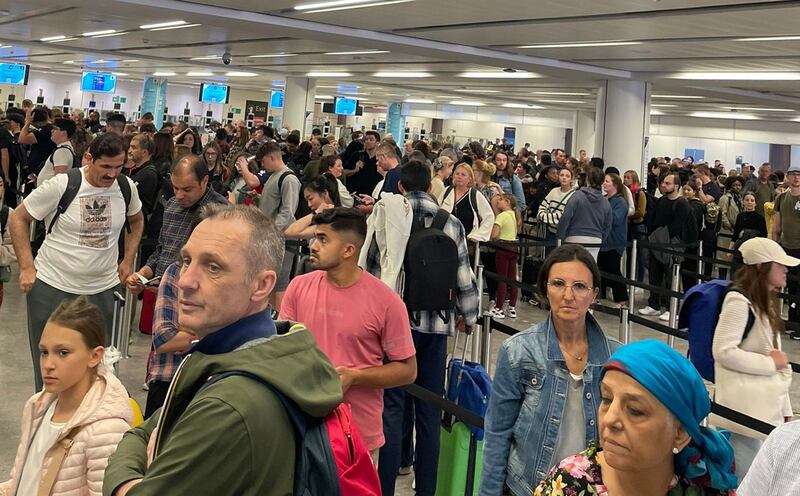 Images shared on social media show long queues at the e-gates in London’s Heathrow Airport. PA