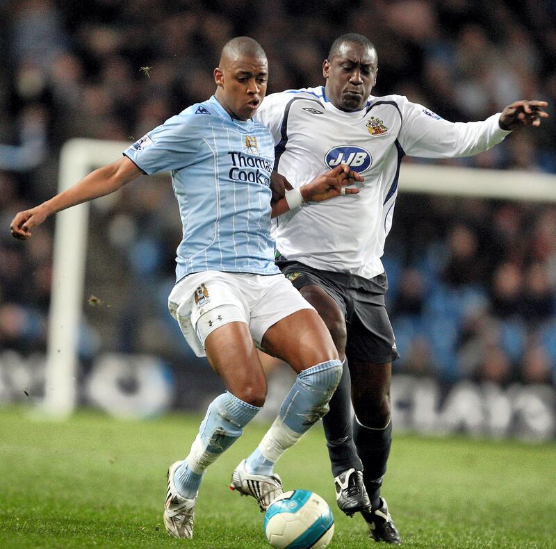 Manchester City's Swiss midfielder Gelson Fernandes (L) Switzerland international who left City in 2009 and now at Eintracht Frankfurt after a busy career involving stints at St Etienne, Chievo, Leicester, Udinese, Sporting Lisbon, Sion, Freiburg and Rennes.  AFP PHOTO 