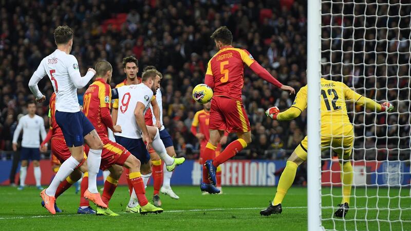 LONDON, ENGLAND - NOVEMBER 14: Harry Kane of England scores his first goal during the UEFA Euro 2020 qualifier between England and Montenegro at Wembley Stadium on November 14, 2019 in London, England. (Photo by Mike Hewitt/Getty Images)