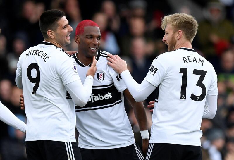 Soccer Football - Premier League - Fulham v Cardiff City - Craven Cottage, London, Britain - April 27, 2019  Fulham's Ryan Babel celebrates scoring their first goal with Aleksandar Mitrovic and Tim Ream   Action Images via Reuters/Tony O'Brien  EDITORIAL USE ONLY. No use with unauthorized audio, video, data, fixture lists, club/league logos or "live" services. Online in-match use limited to 75 images, no video emulation. No use in betting, games or single club/league/player publications.  Please contact your account representative for further details.