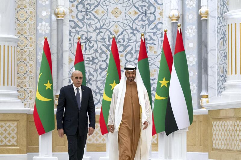 ABU DHABI, UNITED ARAB EMIRATES - February 02, 2020: HH Sheikh Mohamed bin Zayed Al Nahyan, Crown Prince of Abu Dhabi and Deputy Supreme Commander of the UAE Armed Forces (R) receives HE Mohamed Ould Ghazouani, President of Mauritania (L), during an official reception, at Qasr Al Watan. 

( Mohamed Al Hammadi / Ministry of Presidential Affairs )
---