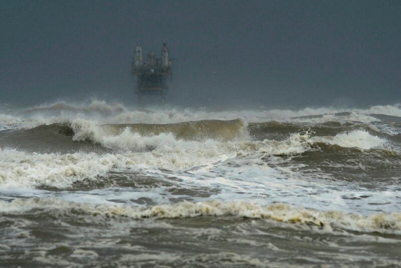 Larger than usual waves come ashore at Crystal Beach as Hurricane Harvey approaches Texas. Guiseppe Barranco / The Beaumont Enterprise via AP