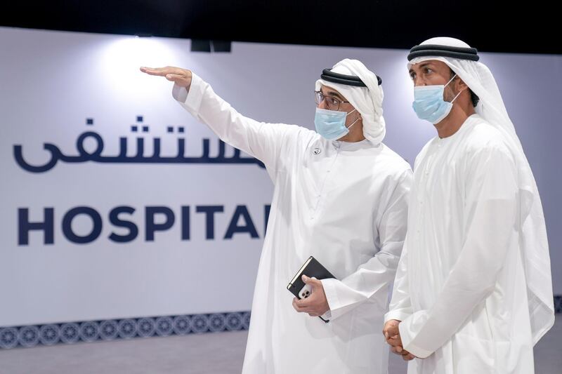 ABU DHABI, UNITED ARAB EMIRATES - May 18, 2020: HH Major General Sheikh Khaled bin Mohamed bin Zayed Al Nahyan, Deputy National Security Adviser, member of the Abu Dhabi Executive Council and Chairman of Abu Dhabi Executive Office (L) visits Emirates Field Hospital, at Emirates Humanitarian City. Seen with HE Mohamed Mubarak Al Mazrouei, Undersecretary of the Crown Prince Court of Abu Dhabi (R).

( Hamad Al Mansoori for the Ministry of Presidential Affairs )​
---