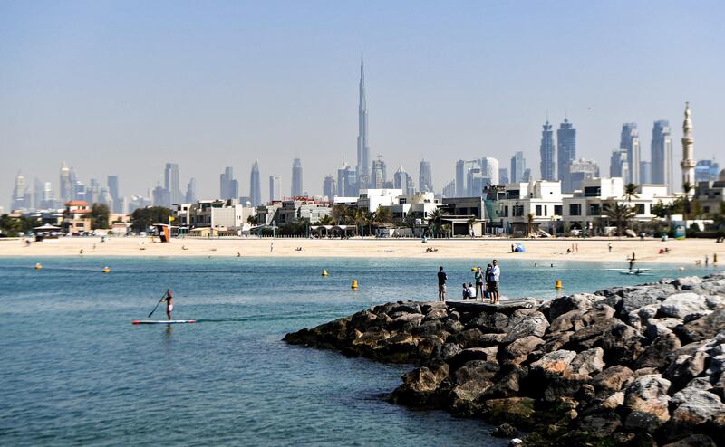 This picture taken on February 1, 2020 shows a view from La Mer North marina in Dubai, with the Burj Khalifa and the Dubai skyline seen in the background. (Photo by KARIM SAHIB / AFP)