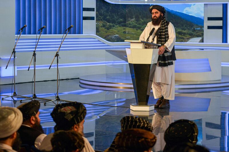 Foreign Minister Amir Khan Muttaqi gives a speech at an event in Kabul marking the first anniversary of the Taliban's return to power in Afghanistan. AFP