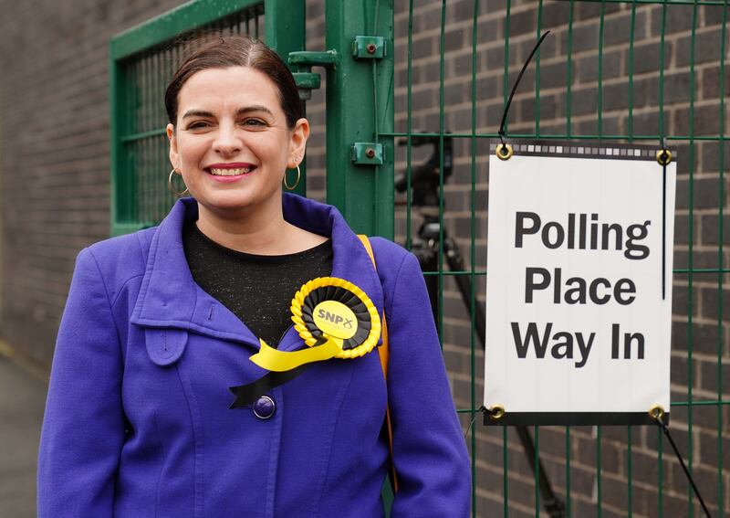 Scottish National Party candidate Katy Loudon outside the polling station at St Charles's Primary School, Cambuslang, during the Rutherglen and Hamilton West by-election. PA 