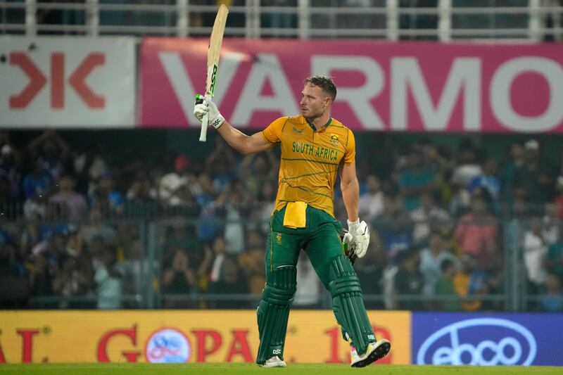 South Africa's David Miller celebrates reaching his century in Guwahati on Sunday. AP