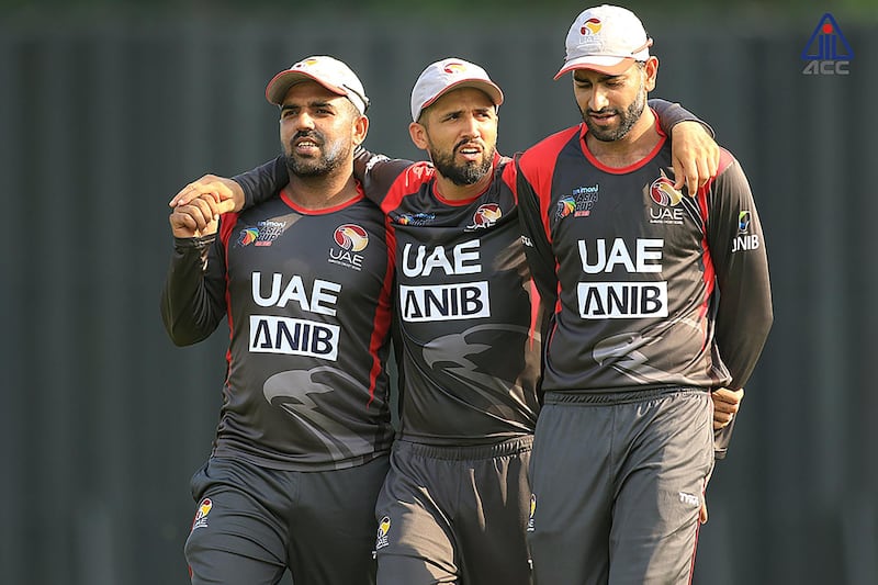 Rohan Mustafa, middle, won the man-of-the-match award after he took two wickets and made a speedy 38 not out in the run chase against Malaysia at the Asia Cup Qualifier. Courtesy ACC
