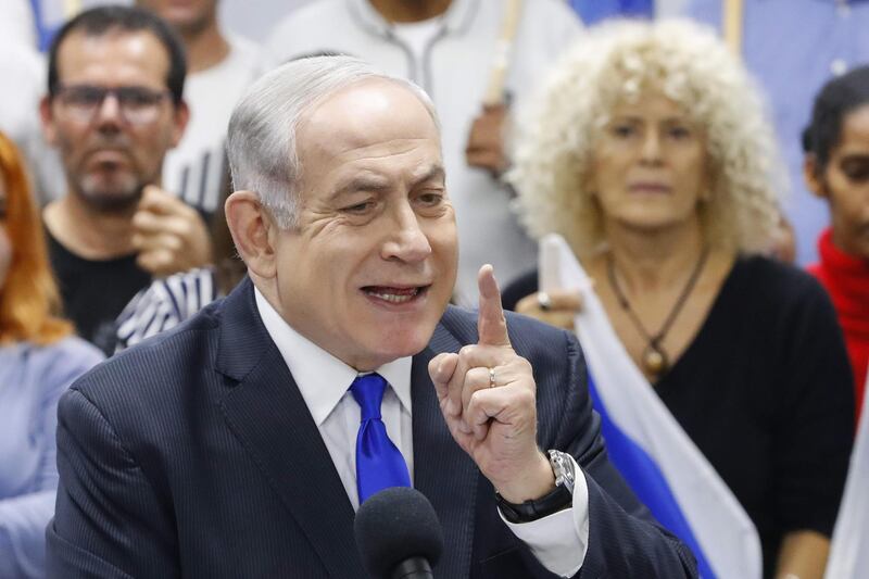 Israel's Prime Minister and leader of the Likud Party Benjamin Netanyahu delivers a statement in the Israeli central city of Petah Tikva on March 7, 2020.   / AFP / Jack GUEZ 
