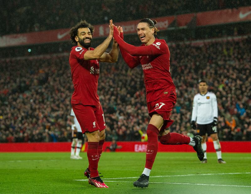 Liverpool's Darwin Nunez celebrates with his teammate Mohamed Salah. EPA