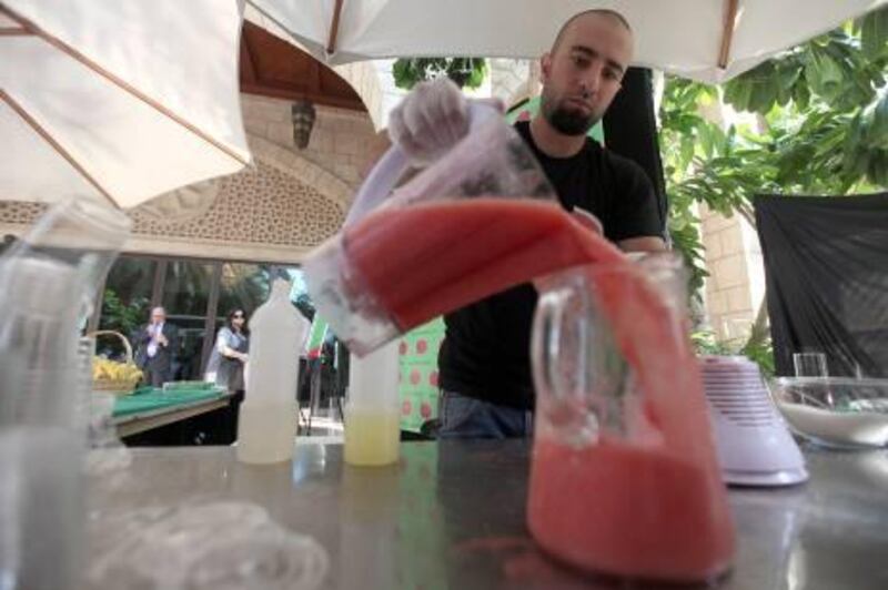 November 8, 2010/ Dubai / Zaid Dkeidek with Batatee5 prepares watermelon juice during the The Celebration of Entrepreneurship conference held at the Madinat Jumeirah Conference Centre in Dubai November 7, 2010.  (Sammy Dallal / The National)