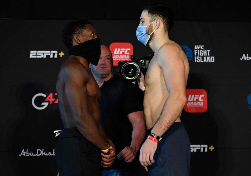 ABU DHABI, UNITED ARAB EMIRATES - JANUARY 15: (L-R) Opponents Phil Hawes and Nassourdine Imavov of Russia face off during the UFC weigh-in at Etihad Arena on UFC Fight Island on January 15, 2021 in Abu Dhabi, United Arab Emirates. (Photo by Jeff Bottari/Zuffa LLC)