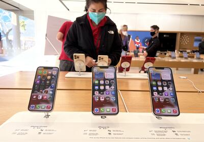 New iPhone 13s  at an Apple store in California. AFP
