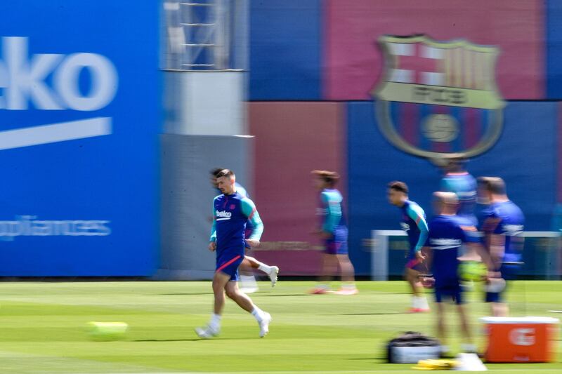 Barcelona defender Clement Lenglet (L) attends a training session at the Joan Gamper Sports City. AFP