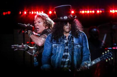 MELBOURNE, AUSTRALIA - FEBRUARY 14: Singer Axl Rose (L) and guitarist Slash perform on stage during the Guns n' Roses 'Not In This Lifetime' tour at the MCG on February 14, 2017 in Melbourne, Australia. (Photo by Paul Rovere/Getty Images)