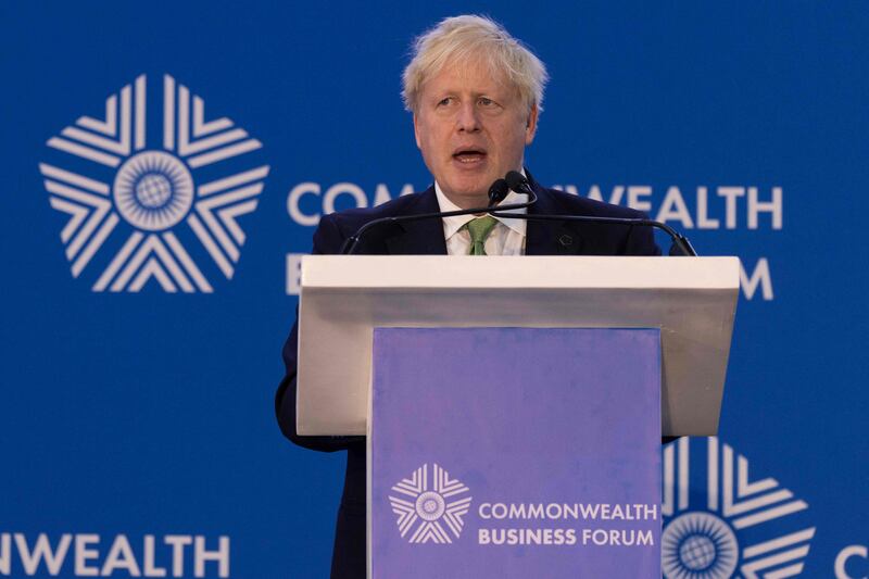 British Prime Minister Boris Johnson delivers a speech at a business forum in Kigali on Thursday as part of the Commonwealth Heads of Government Meeting.  AFP
