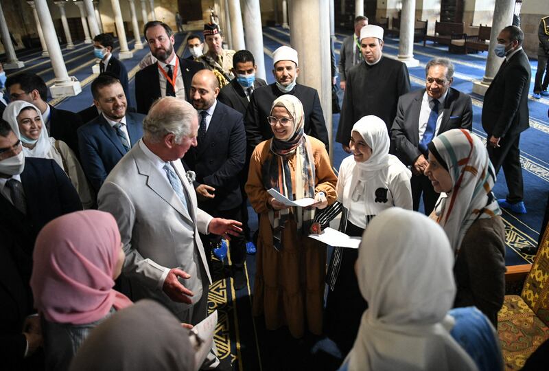 Prince Charles surrounded by students on a visit to Al Azhar Mosque in the Egyptian capital, Cairo. AFP