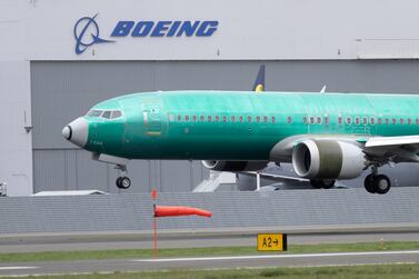 A Boeing 737 MAX 8 . The company mishandled the crisis surrounding the jet, analysts say. AP