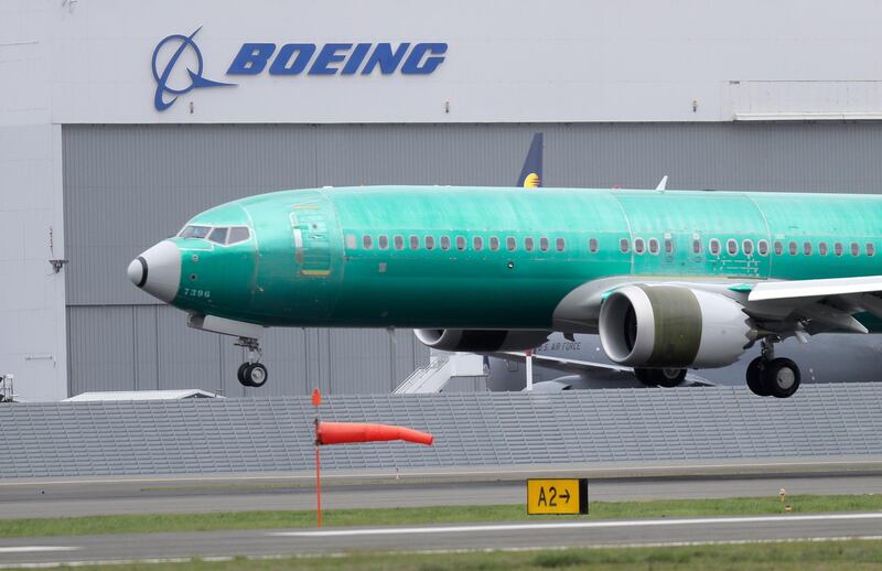 FILE - In this April 10, 2019, file photo a Boeing 737 MAX 8 airplane being built for India-based Jet Airways lands following a test flight at Boeing Field in Seattle. The grounding of Boeing 737 Max jets likely means that fare increases this summer will be larger than already expected and airlines will struggle to handle disruptions such as storms that shut down hub airports. (AP Photo/Ted S. Warren, File)