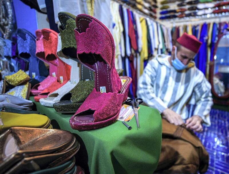 Abu Dhabi, United Arab Emirates, January 10, 2021. A shoe maker from Kingdom of Morocco  area at the  Sheikh Zayed Festival.
Victor Besa/The National
Section:  NA
Reporter:  Saeed Saeed
