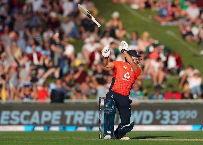 England's David Milan loses loses grip of his bat while playing a shot. AP